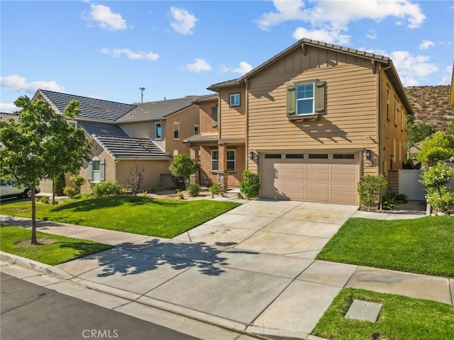 view of front of house featuring a garage and a front yard