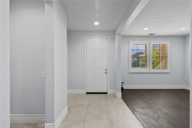 entrance foyer featuring light tile patterned floors