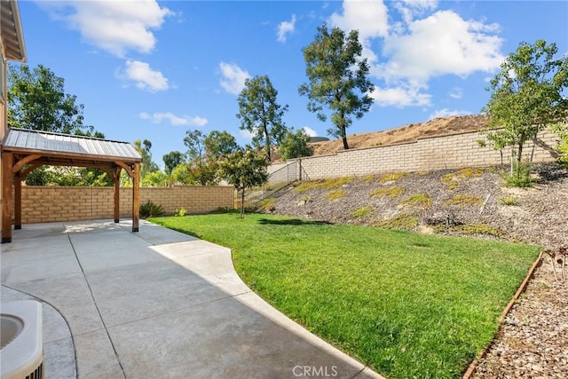 view of yard with a gazebo and a patio area