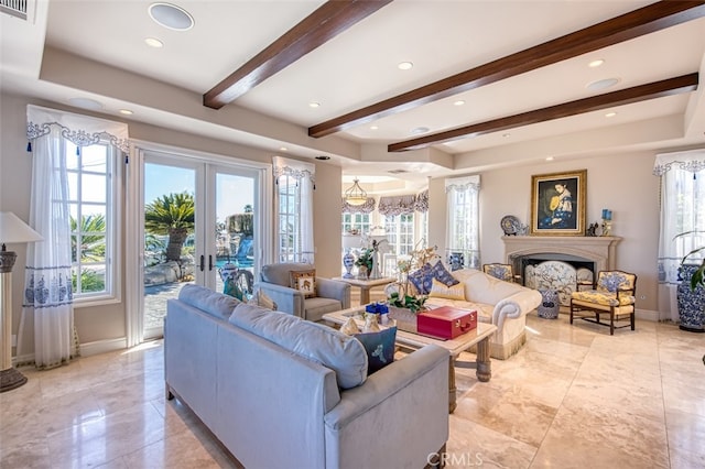 living room with beam ceiling, plenty of natural light, and french doors