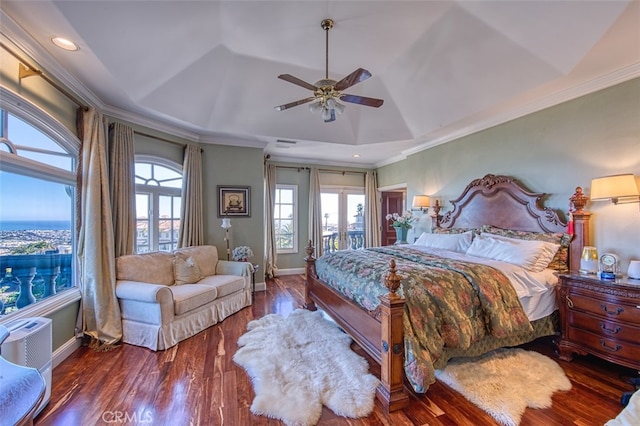 bedroom featuring ornamental molding, vaulted ceiling, ceiling fan, and dark wood-type flooring