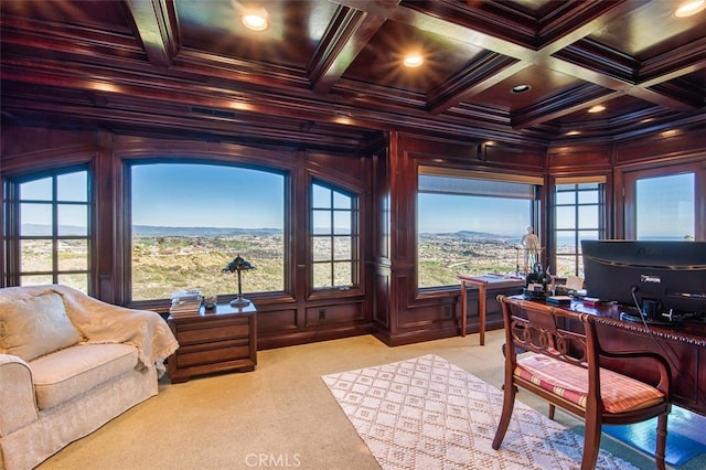 carpeted office with wooden walls, coffered ceiling, and crown molding