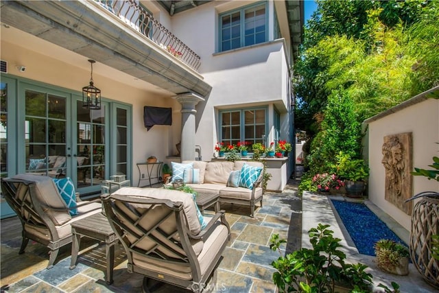 view of patio / terrace featuring outdoor lounge area and french doors