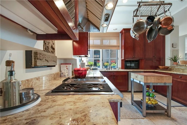 kitchen featuring ventilation hood, lofted ceiling with beams, sink, light stone countertops, and stainless steel appliances