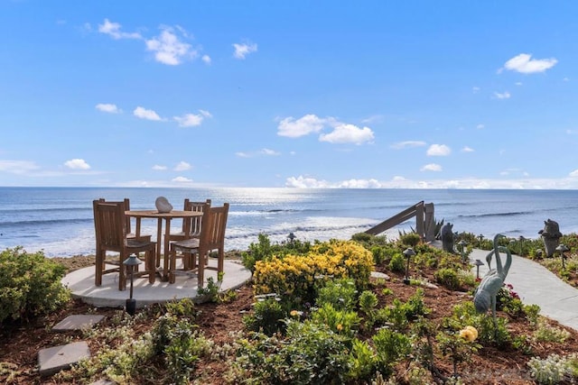 exterior space featuring a beach view