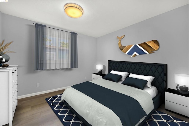 bedroom featuring dark hardwood / wood-style floors