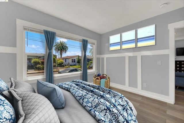 bedroom with hardwood / wood-style flooring