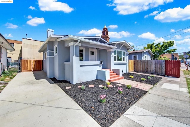 bungalow-style home with covered porch