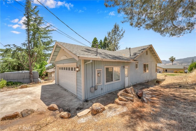 exterior space with a garage