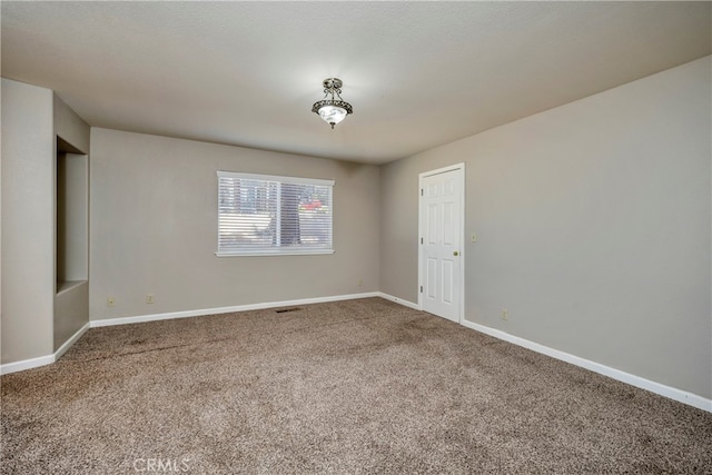 view of carpeted spare room