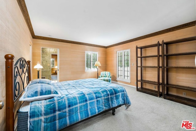 bedroom featuring crown molding and carpet flooring