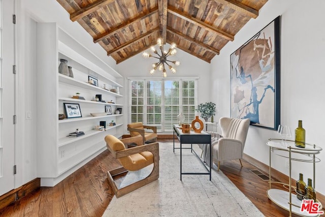 living area with wood-type flooring, a chandelier, built in shelves, vaulted ceiling with beams, and wooden ceiling