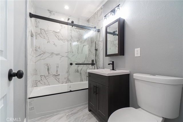 full bathroom with vanity, toilet, and bath / shower combo with glass door