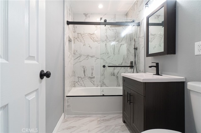 full bathroom featuring vanity, enclosed tub / shower combo, and toilet