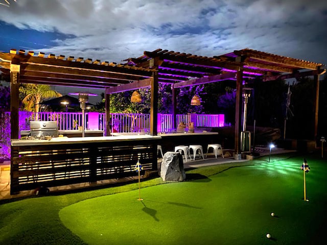 view of patio with a pergola and grilling area