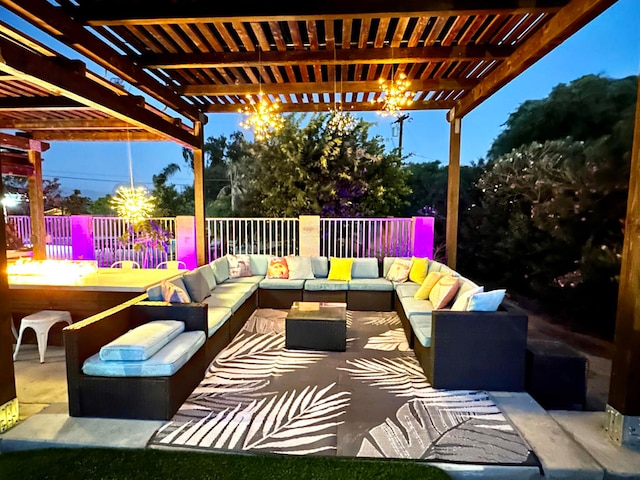 view of terrace featuring a pergola and outdoor lounge area