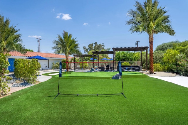 view of home's community featuring a playground, a pergola, and a lawn