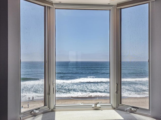 view of water feature with a beach view