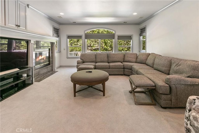 living room with crown molding and light colored carpet