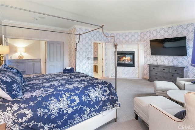 bedroom featuring light colored carpet, crown molding, and a tile fireplace