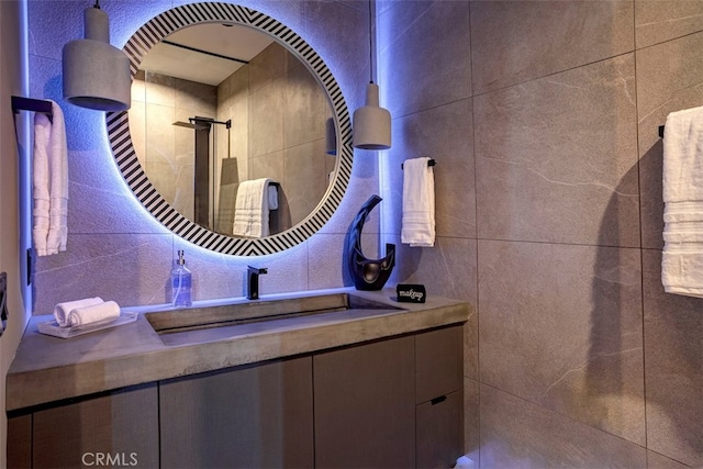 bathroom featuring vanity and walk in shower