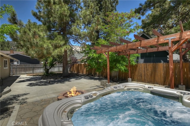 view of swimming pool featuring a pergola, a patio, and a hot tub