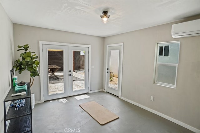 doorway featuring french doors, concrete flooring, and an AC wall unit