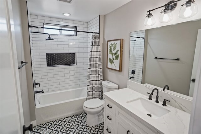 full bathroom with shower / bath combo, vanity, toilet, and tile patterned floors