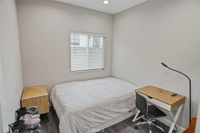 bedroom featuring dark hardwood / wood-style floors