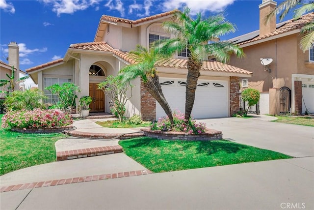 mediterranean / spanish-style house featuring a garage