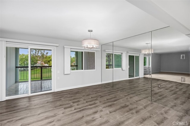 empty room featuring hardwood / wood-style floors