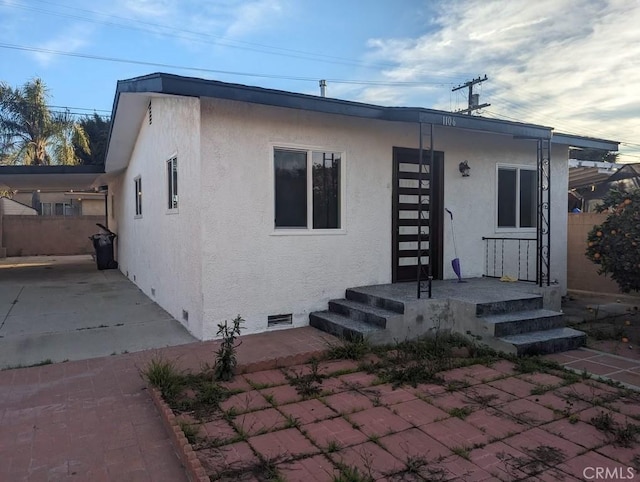 view of front facade with a patio