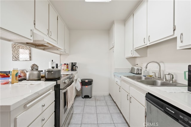 kitchen with light tile patterned flooring, white cabinetry, and stainless steel appliances