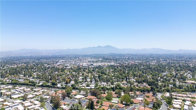 drone / aerial view featuring a mountain view