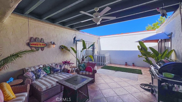 view of patio / terrace with an outdoor living space and ceiling fan