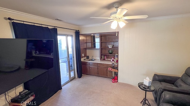 interior space featuring visible vents, crown molding, light colored carpet, light countertops, and open shelves