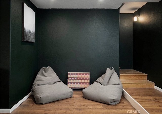 living area featuring hardwood / wood-style floors