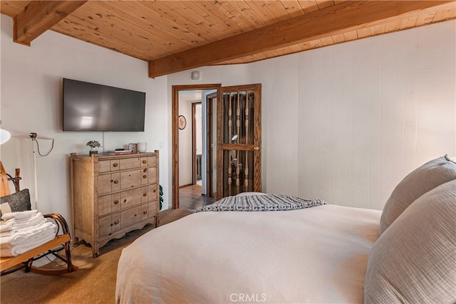 bedroom featuring wood ceiling, carpet flooring, and beamed ceiling