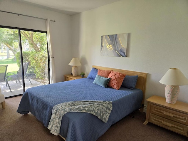 bedroom featuring access to outside and dark carpet