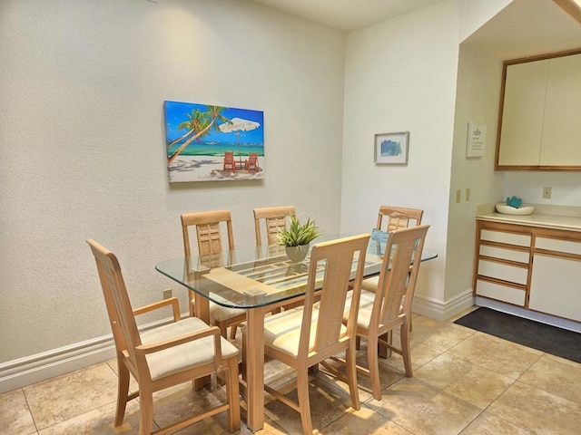 view of tiled dining space