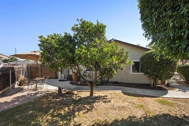 rear view of house featuring a patio