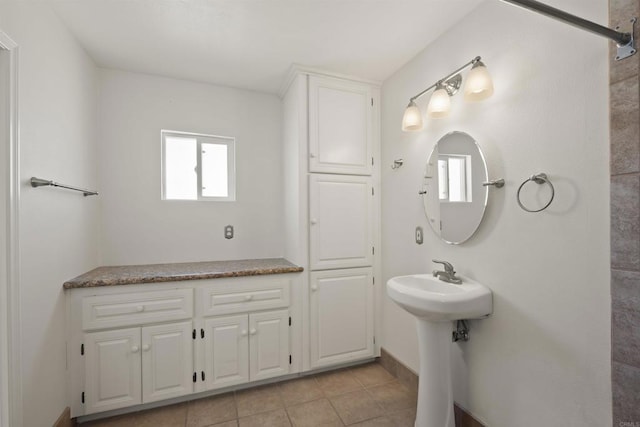 bathroom with tile patterned flooring