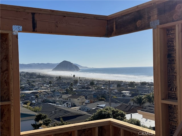 property's view of city featuring a water and mountain view