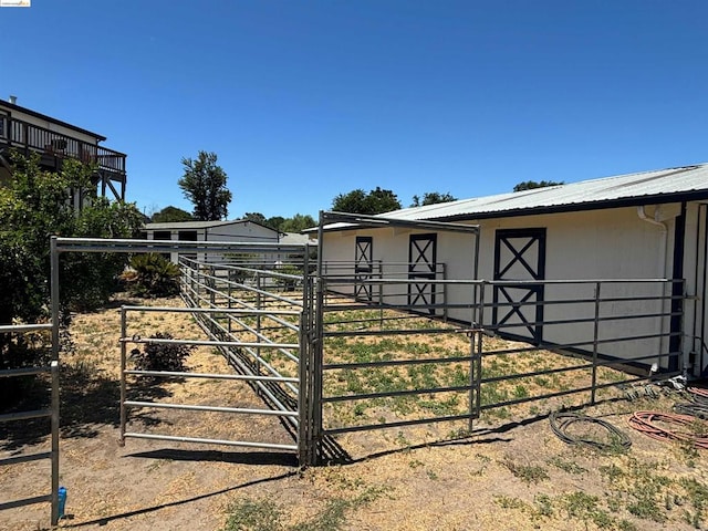 exterior space featuring an outbuilding