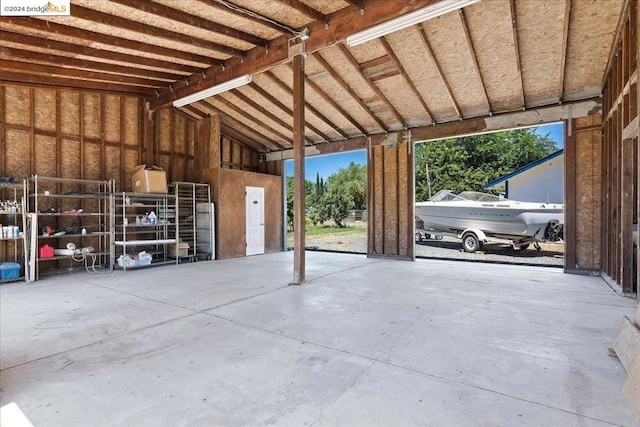 garage featuring a carport