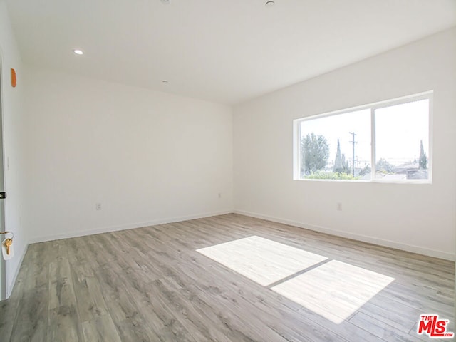 empty room featuring light hardwood / wood-style floors