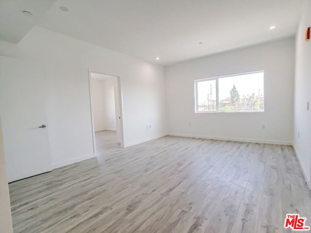 empty room with light wood-type flooring