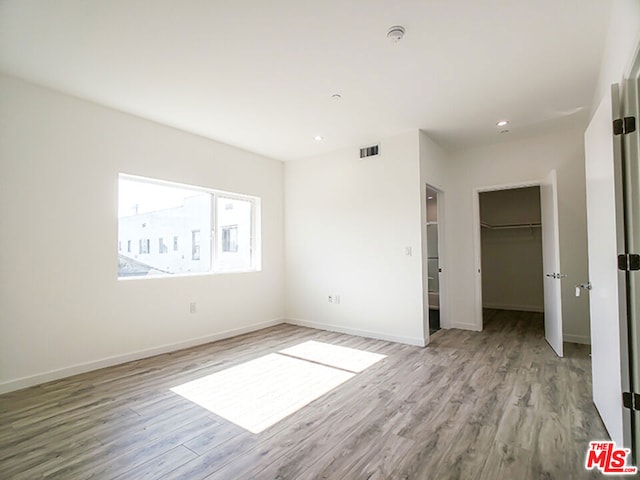 unfurnished bedroom featuring light hardwood / wood-style floors