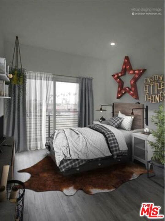 bedroom featuring wood-type flooring