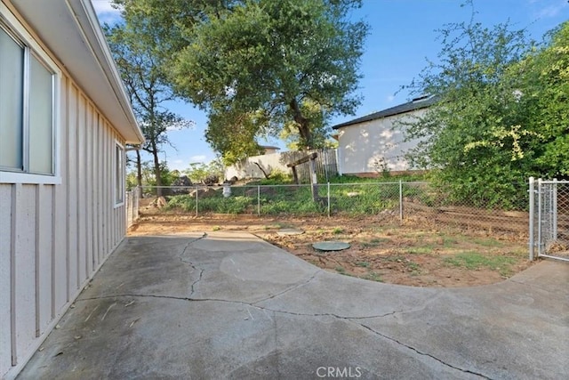 view of patio / terrace featuring fence